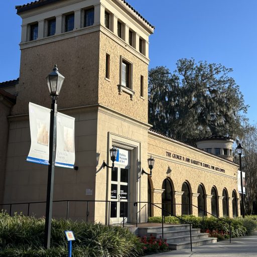 Front view of the Rollins Museum of Art brown buiilding 