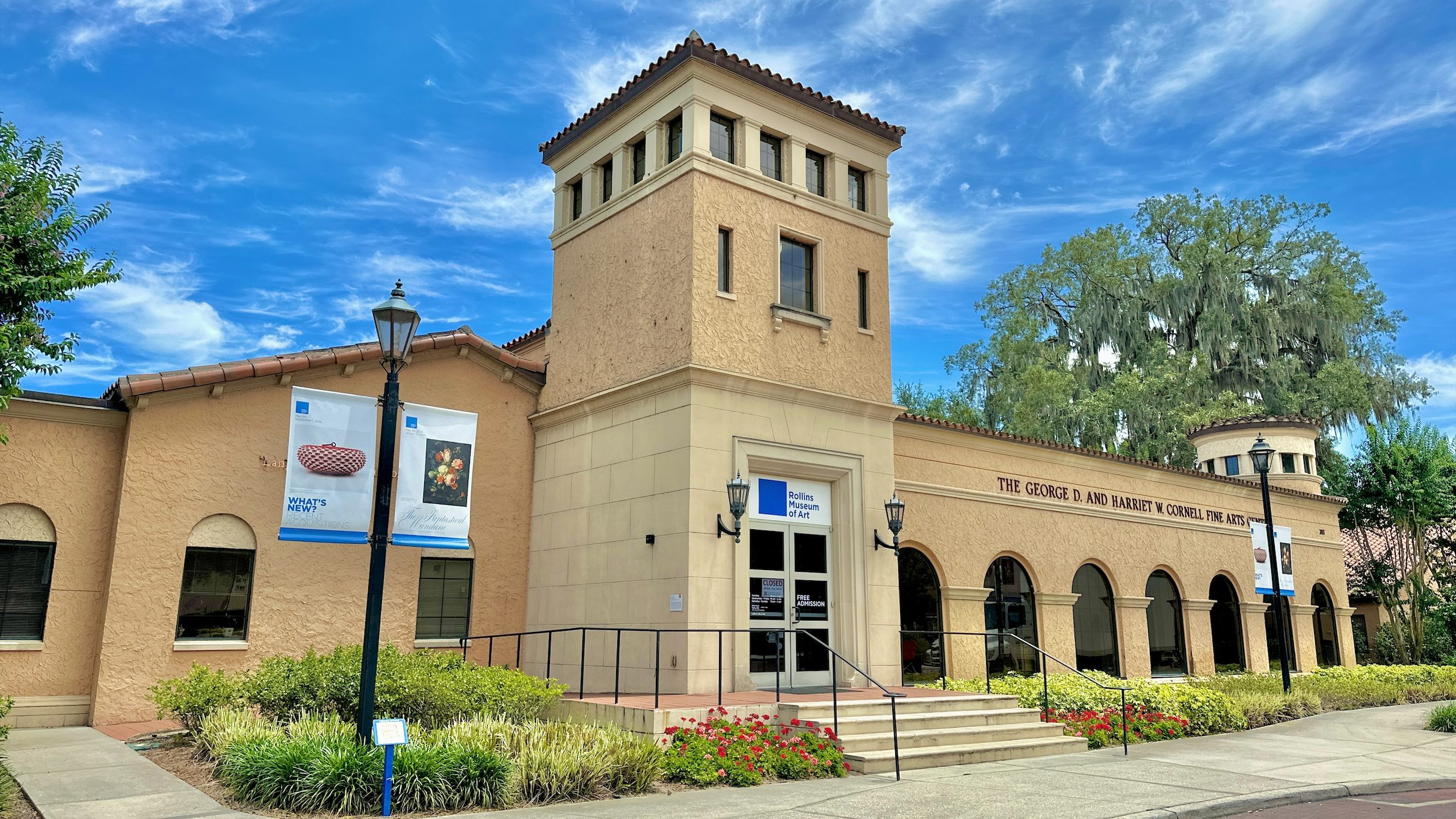 Rollins Museum of Art a tan, one story building with a tower